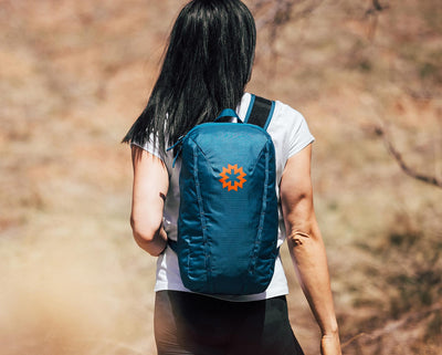 Remote Z backpack for day hikes in blue; on model; promotional product for businesses and events